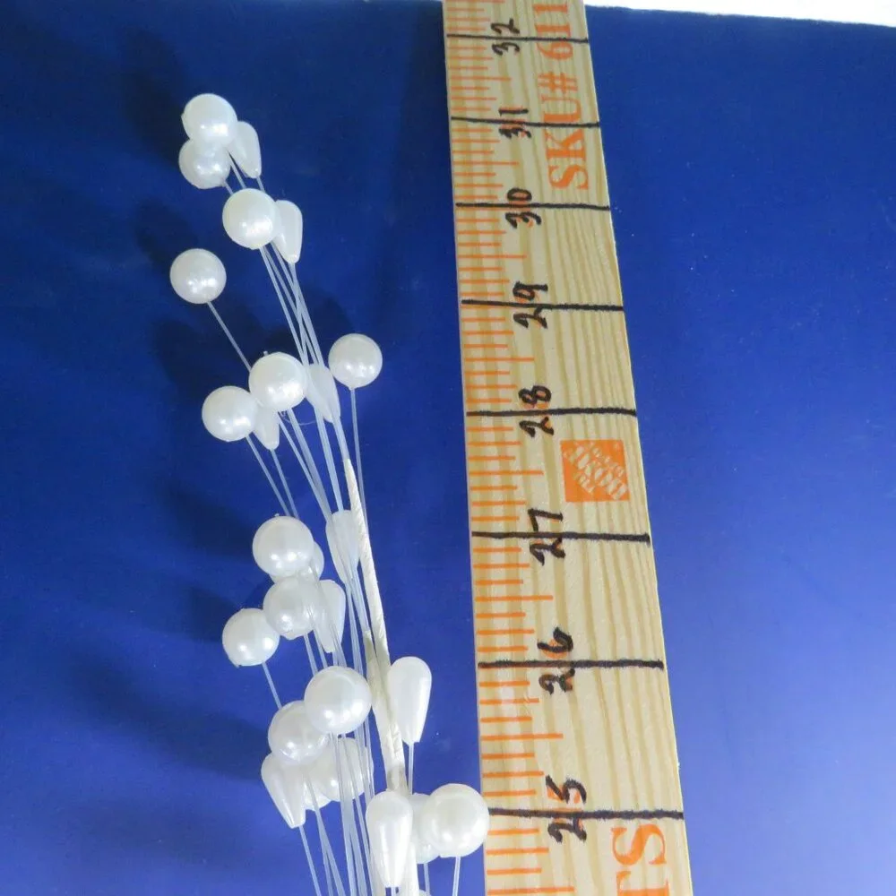 Pearl Cascading Floral Pick (has some wire but mostly clear filament) vintage